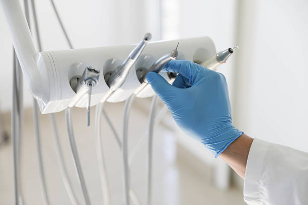 Professional Root Canal Treatment technician working in Payson, IL